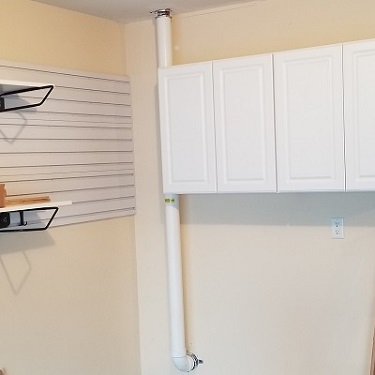 Radon mitigation system inside home.