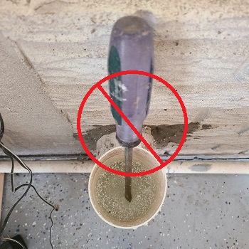 Inadequate pipe slope caused water/condensate to fill pipe