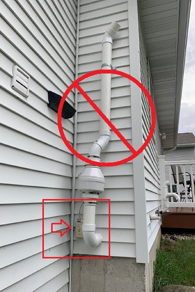 Radon outdoor outlet with fittings that are not waterproof.