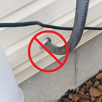 Radon outdoor outlet with fittings that are not waterproof.